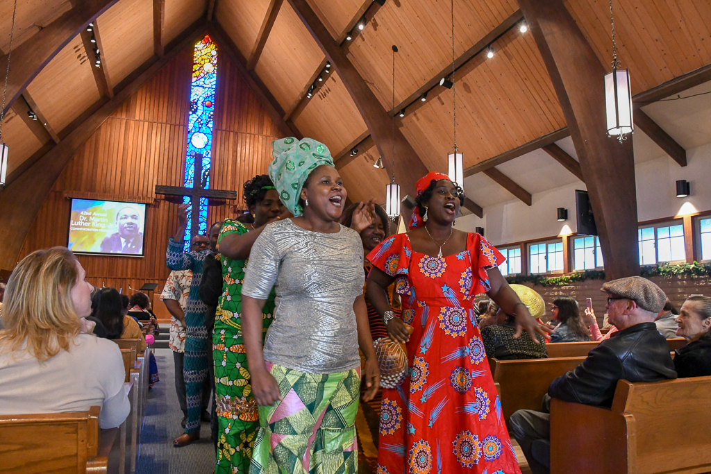 New Bridge Presbyterian Church of Hayward choir members sing through the aisle at the 2019 Dr. King Celebration